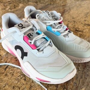 On Running Women's White Sneakers
THE ROGER PRO FIRE CLAY